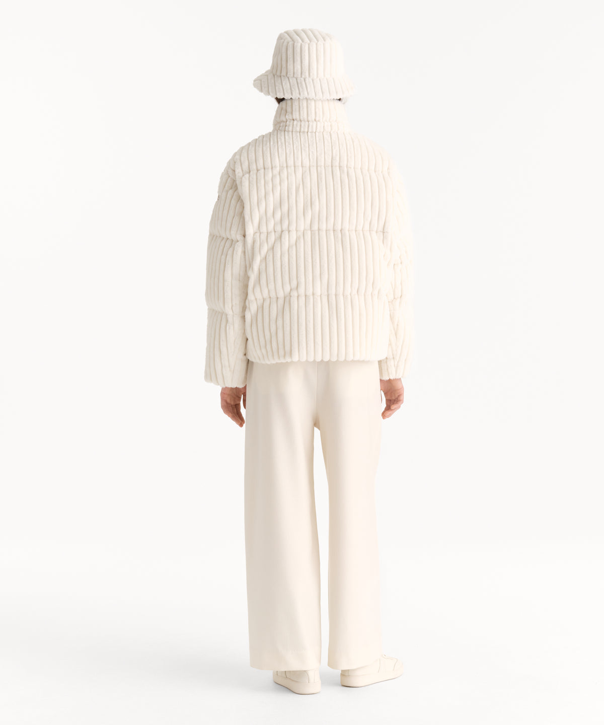 The model is 176 cm tall and is wearing free size in IVORY.