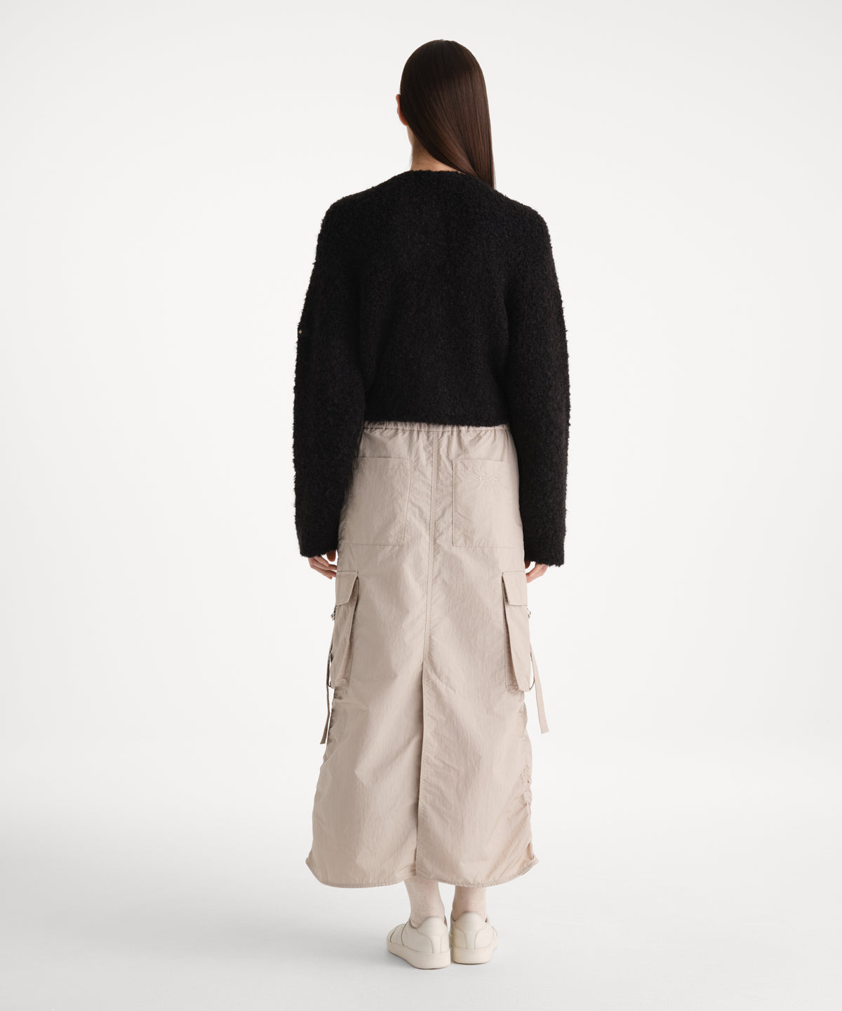 The model is 176 cm tall and is wearing a size 2 in BLACK.