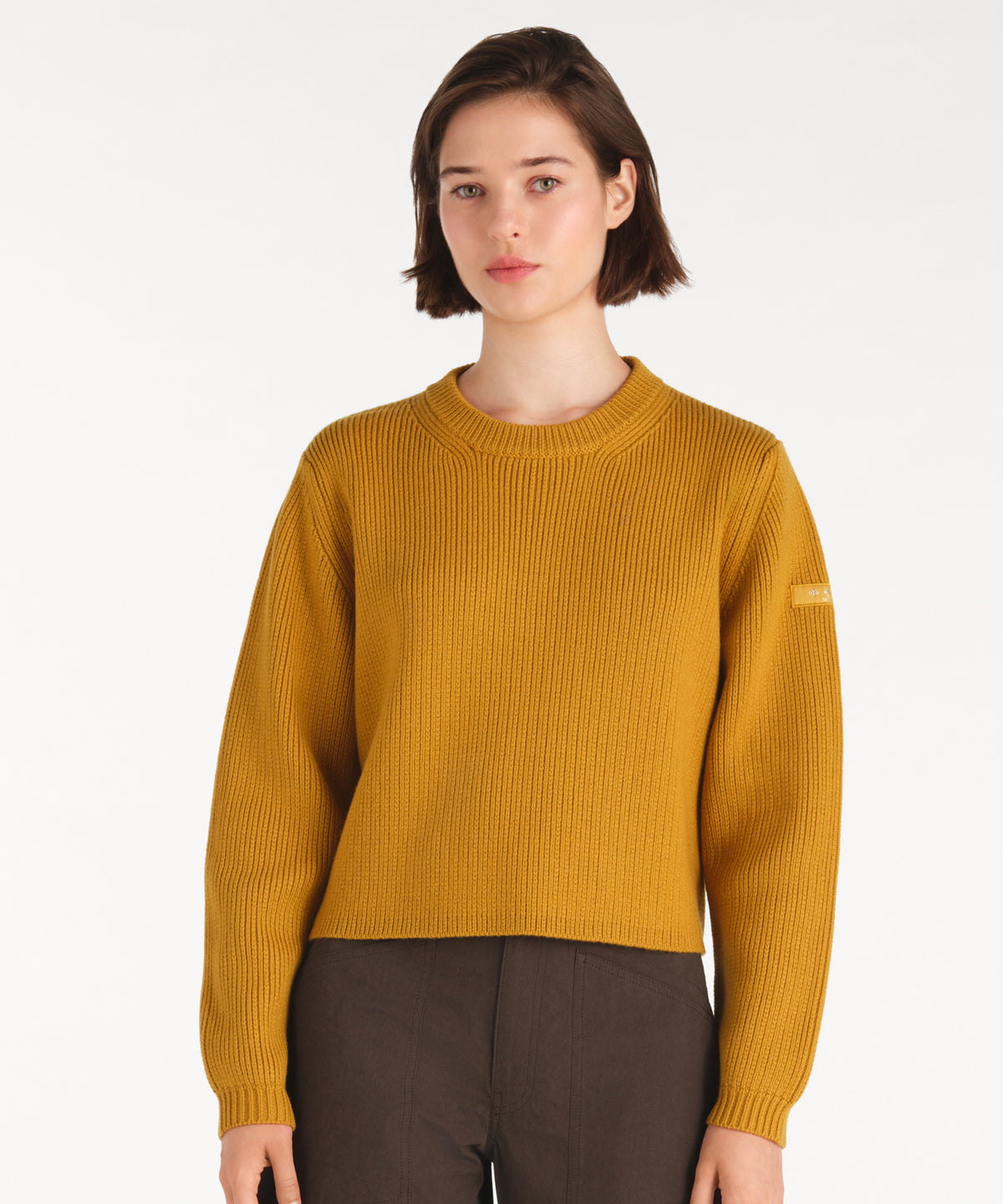 The model is 177 cm tall and is wearing a size 2 in MUSTARD.
