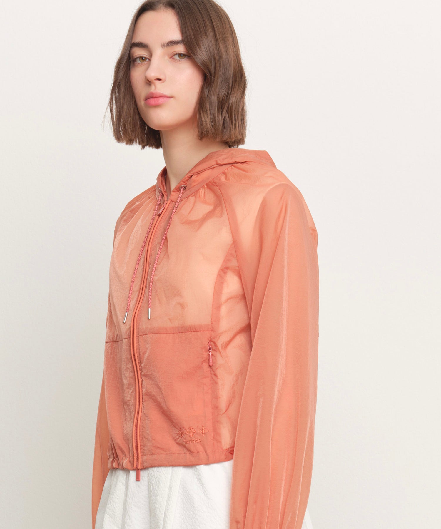 The model is 181 cm tall and is wearing a size 2 in ORANGE.