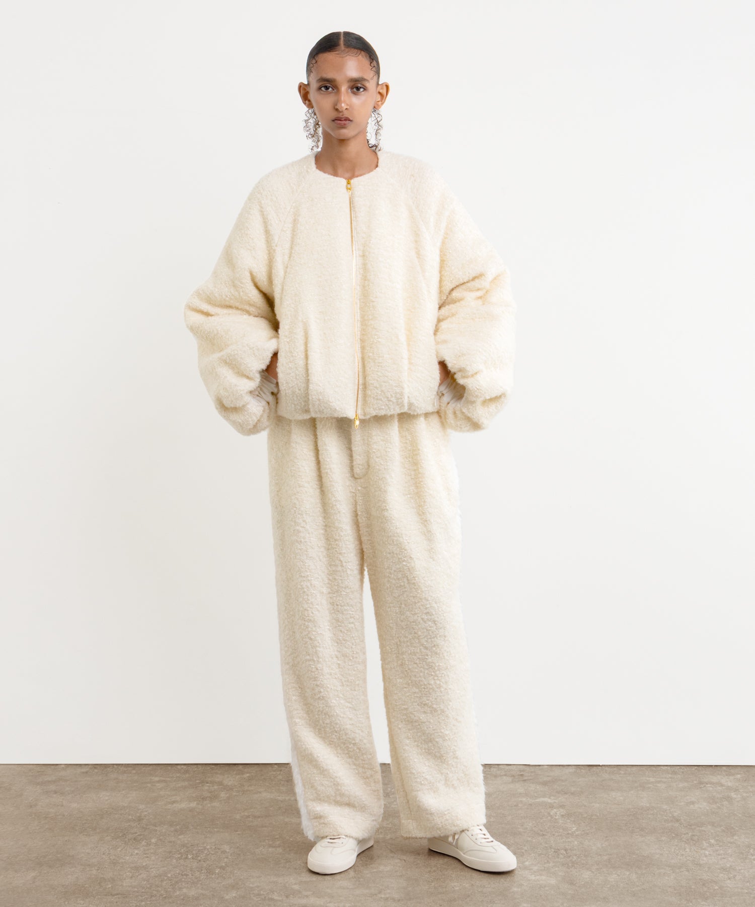 The model is 177 cm tall and is wearing a size 2 in Ivory.