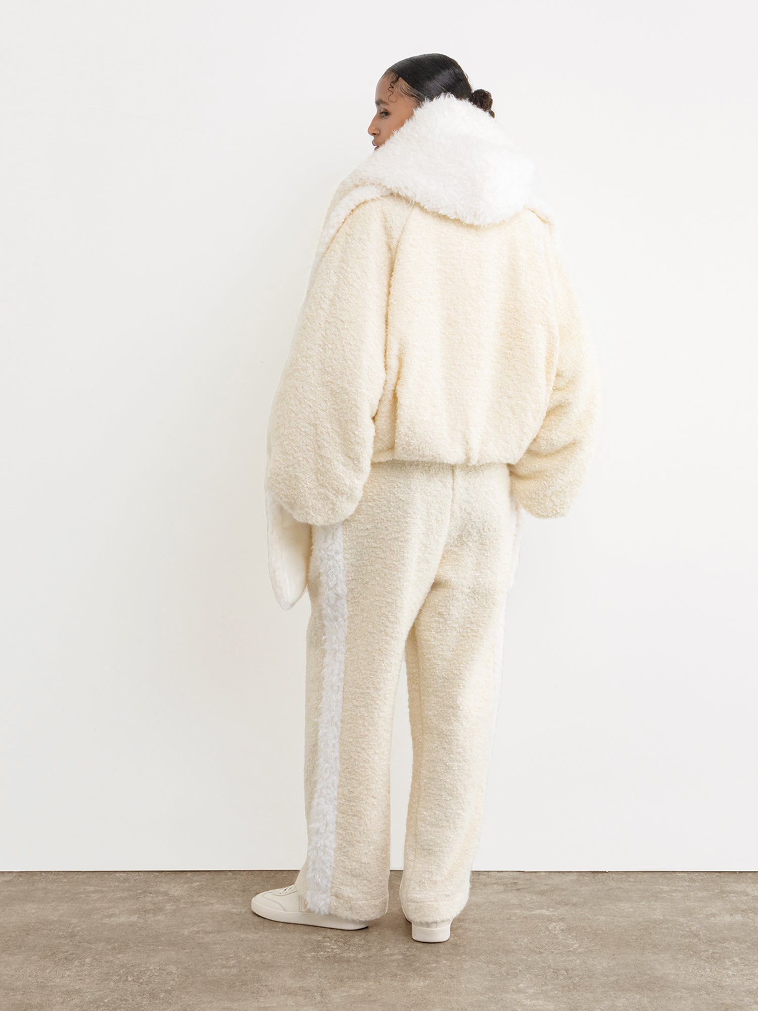 The model is 177 cm tall and is wearing a free size in White.