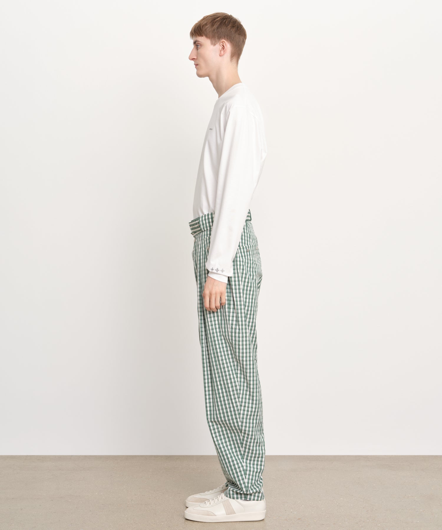 The model is 189 cm tall and is wearing a size 3 in Green.