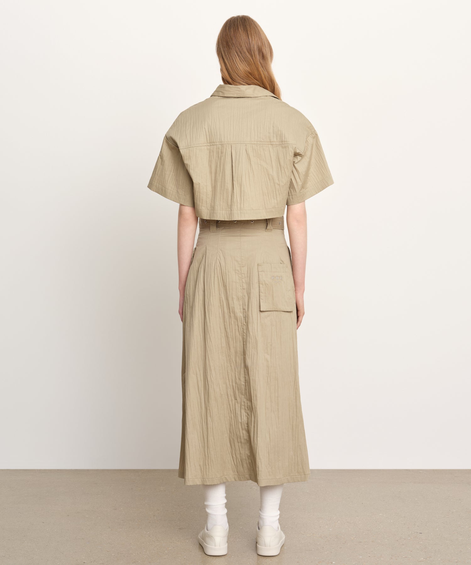 The model is 176 cm tall and is wearing a size 2 in BEIGE.