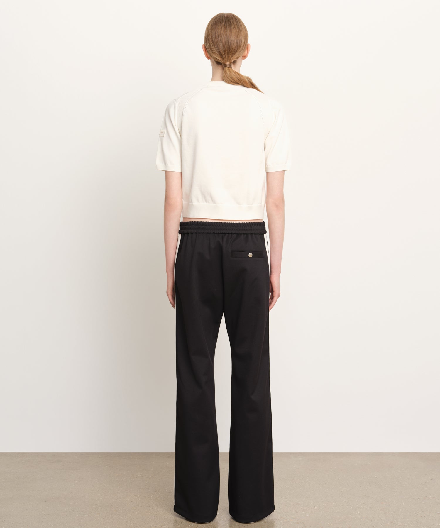 The model is 176 cm tall and is wearing a size 2 in WHITE.